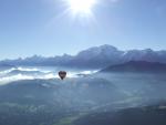 hot air ballooning in front of Mont Blanc range